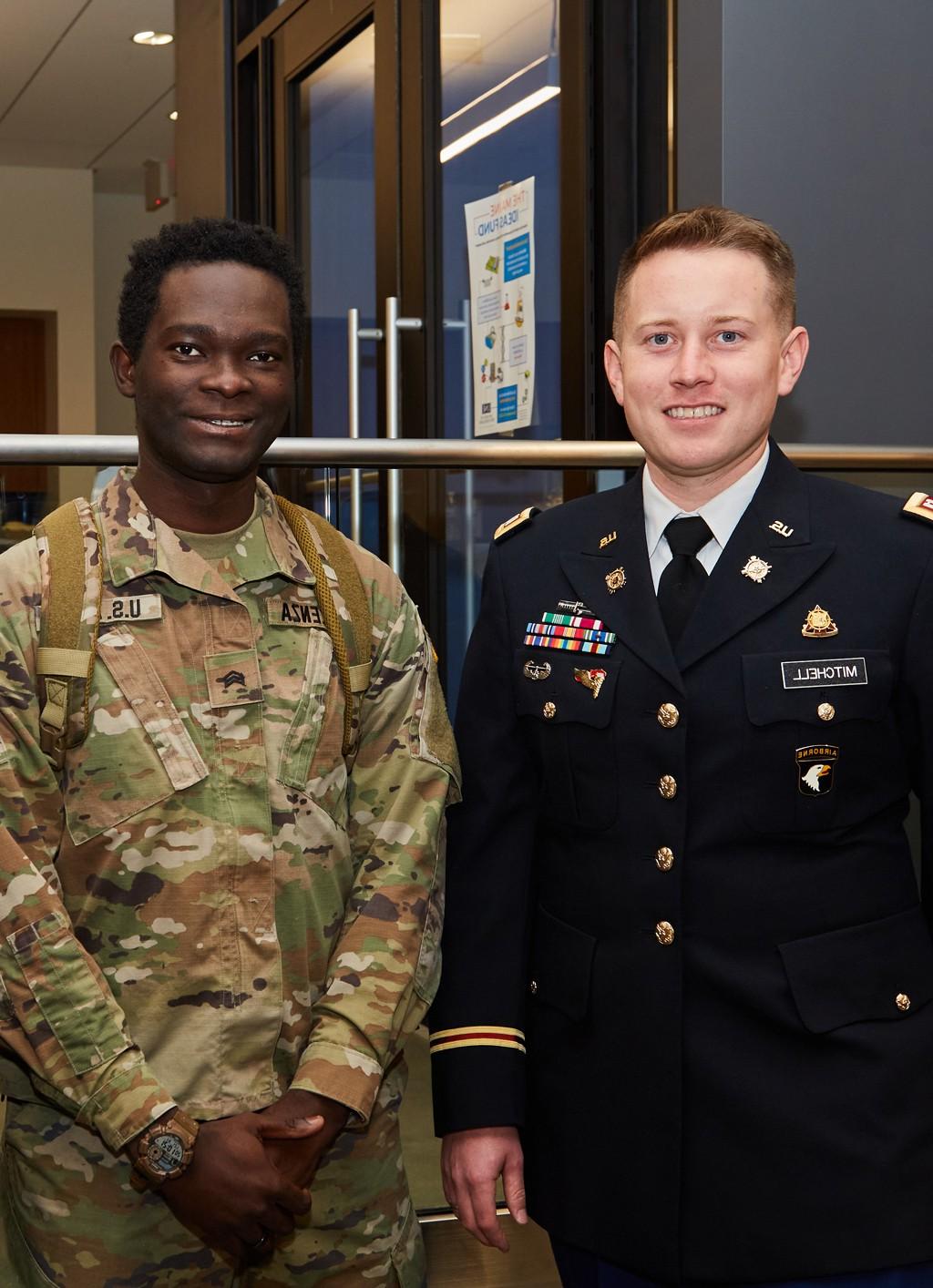 Two veterans stand side-by-side